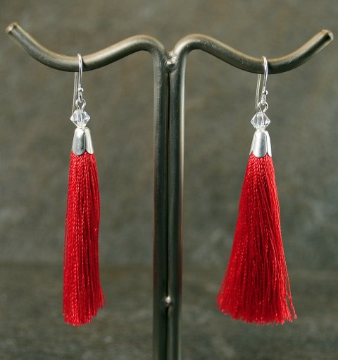 Mrk rd tassel reringe